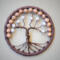 wire-wrapped tree of life home decor features brown wire branches with pearl-like beads, framed in green yarn. 